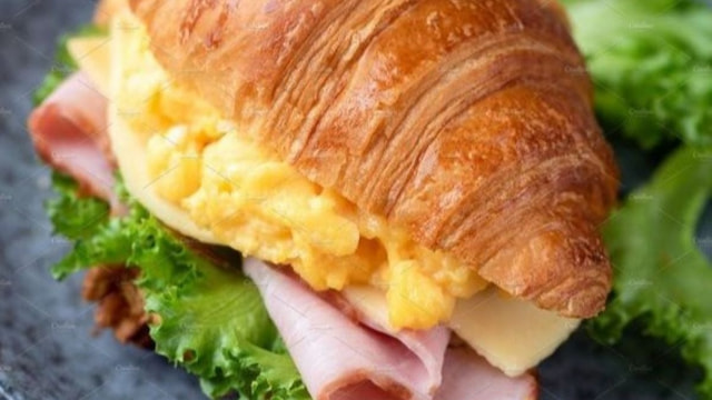 Ham Egg and swiss on Croissant with lettuce